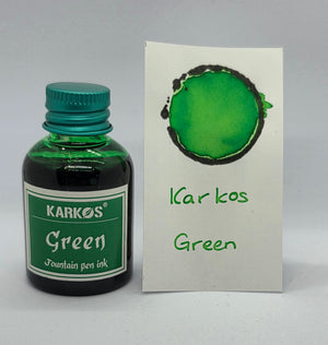 Karkos Green ink bottle with a written swatch