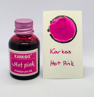 Karkos Pink ink bottle with a written swatch
