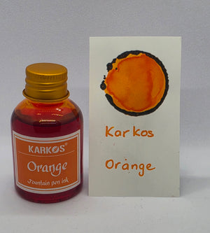 Karkos Orange ink bottle with a written swatch