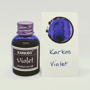Karkos Violet ink bottle with a written swatch