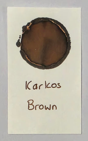Karkos Brown ink written swatch on paper